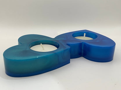 Portacandele "Cuori Connessi" - Creazione artigianale in resina epossidica con effetto marmorizzato blu.