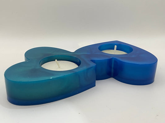 Portacandele "Cuori Connessi" - Creazione artigianale in resina epossidica con effetto marmorizzato blu.